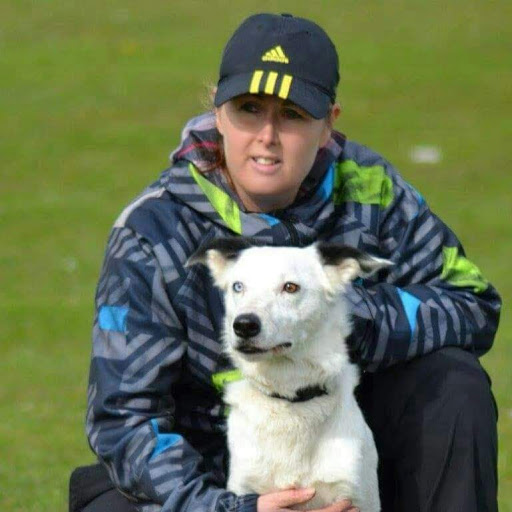 Photo of Linda with one of her dogs.